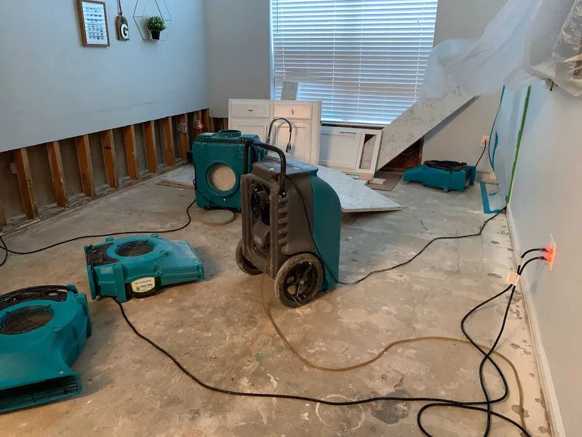 Dehumidifier in flood-cut room for Water Damage Restoration in Carbondale